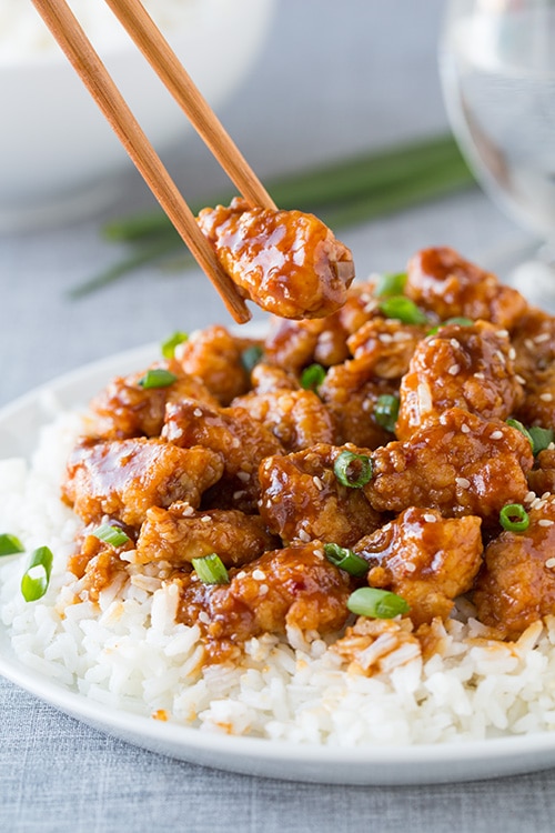 Chopsticks picking up homemade General Tso's Chicken 
