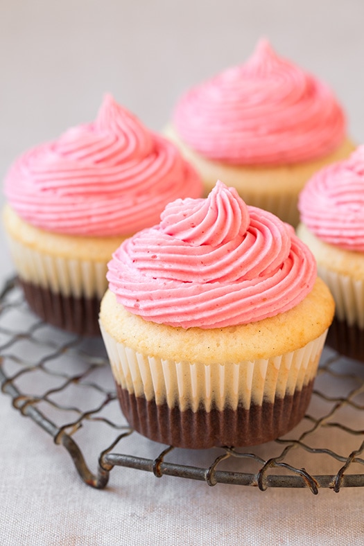 four Neapolitan Cupcakes on wire rack