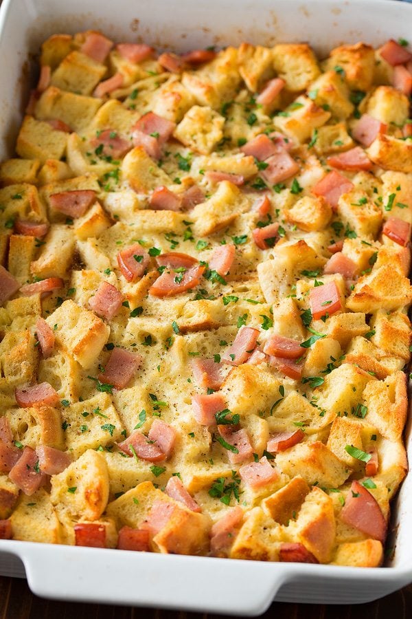Overnight Eggs Benedict Casserole after baking in a white baking dish.
