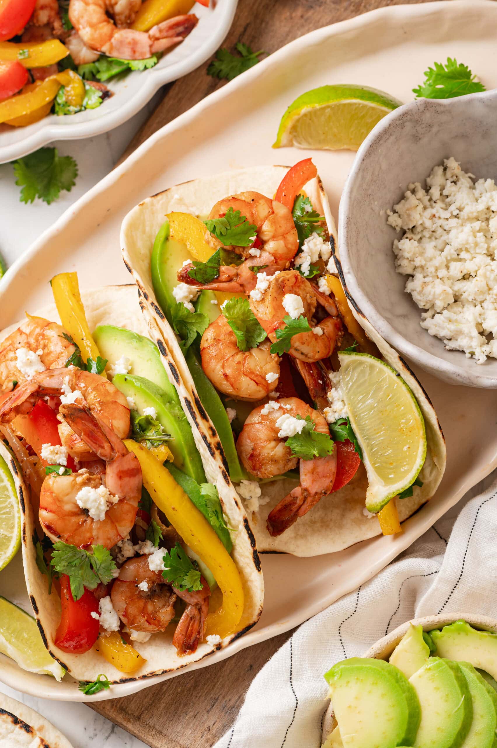Folded fajitas shown like tacos.