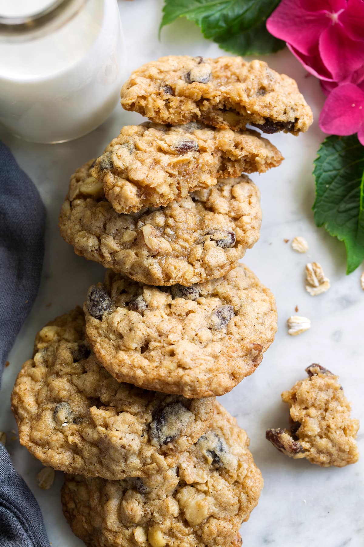 Stack of Oatmeal Cookies, one broken to show interior.