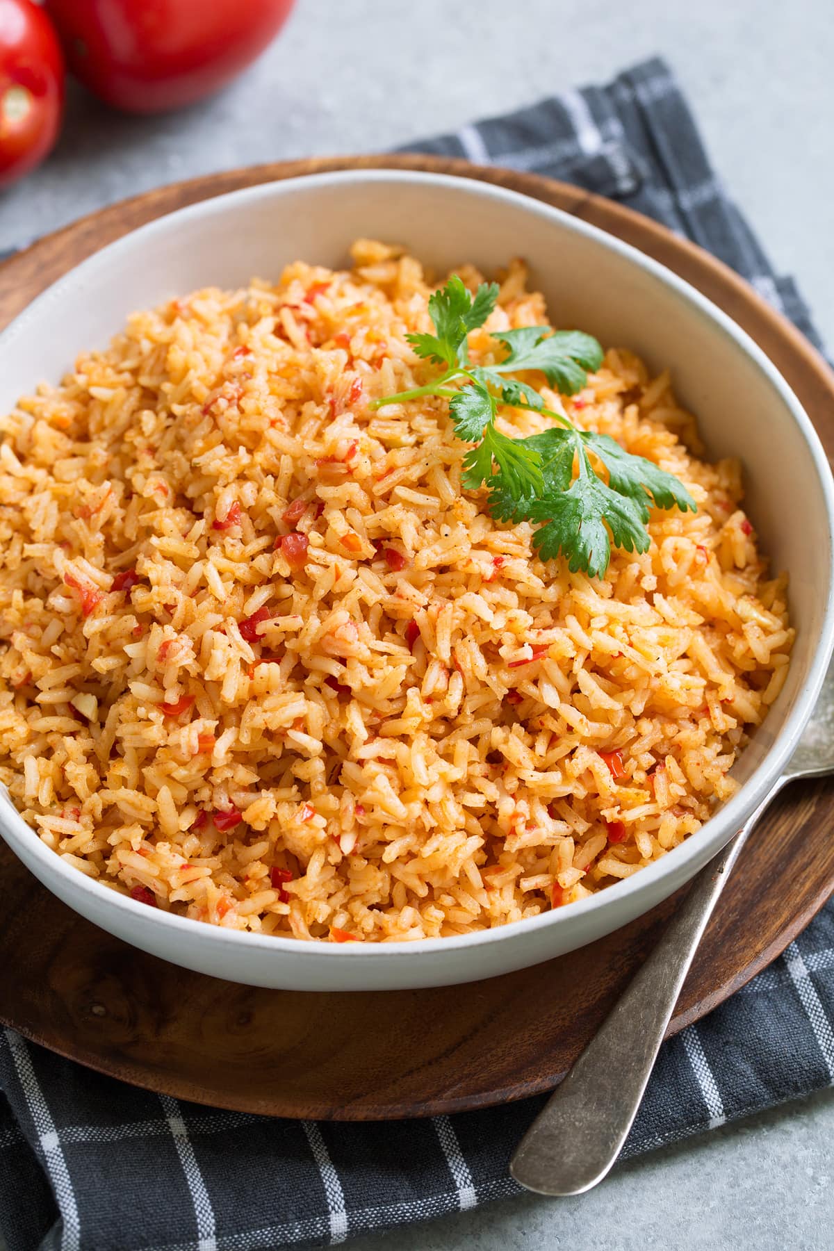 Bowl full of Mexican Rice garnished with cilantro.
