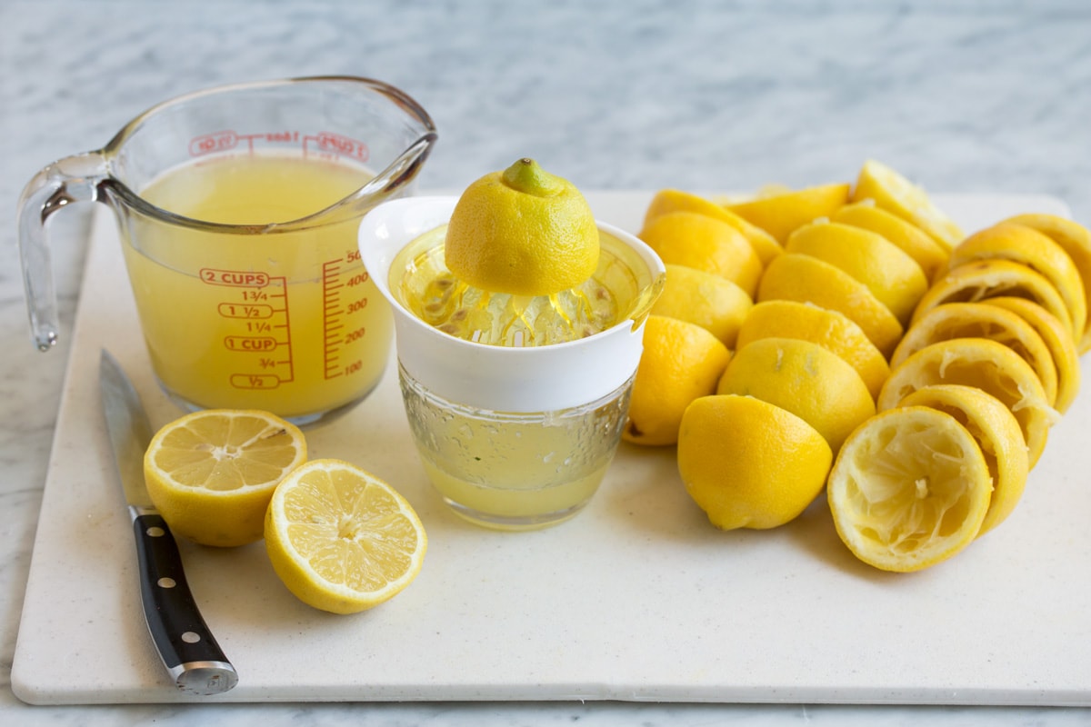 Homemade Lemonade Juicing fresh lemons.