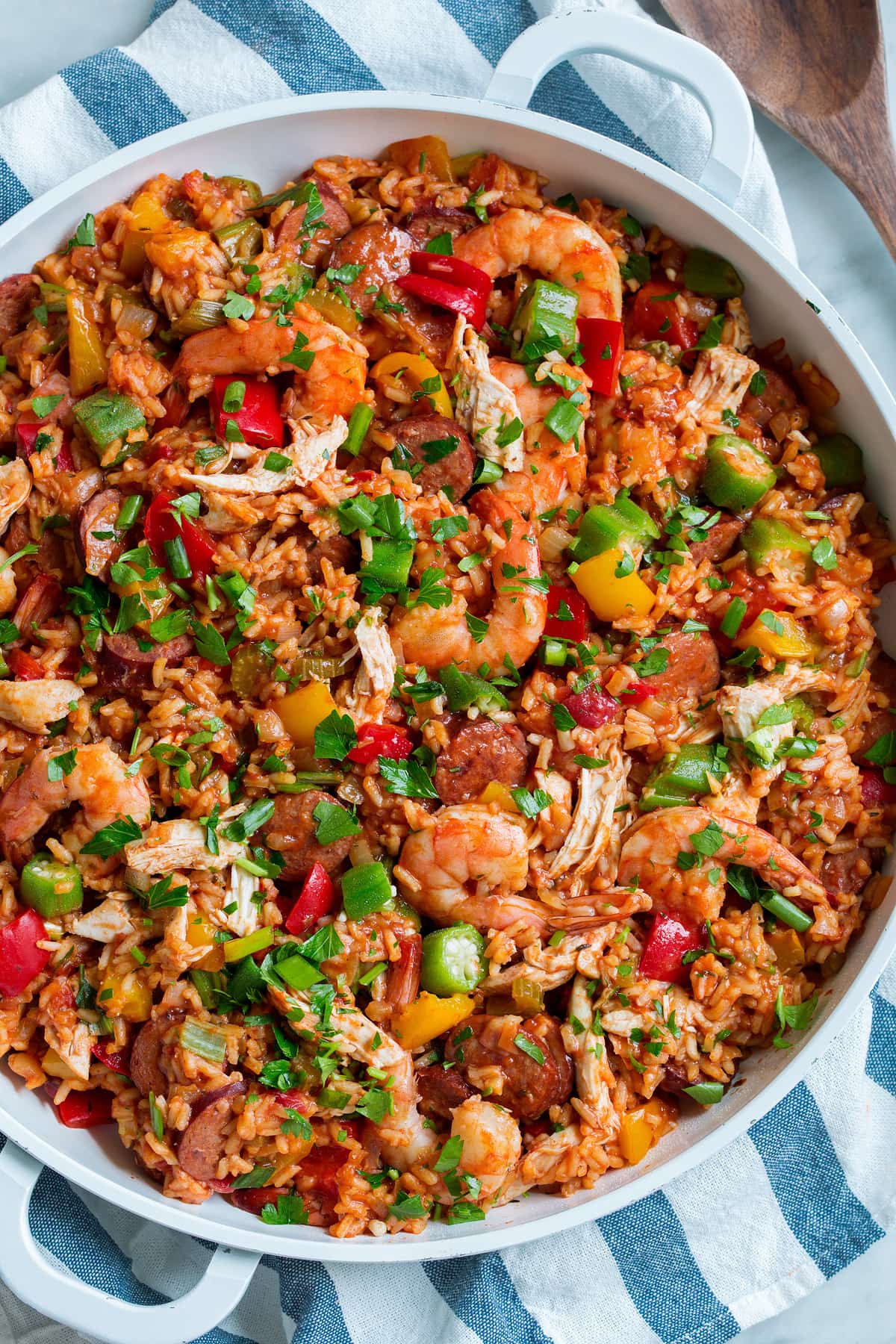 Overhead image of a large paella pan full of jambalaya.