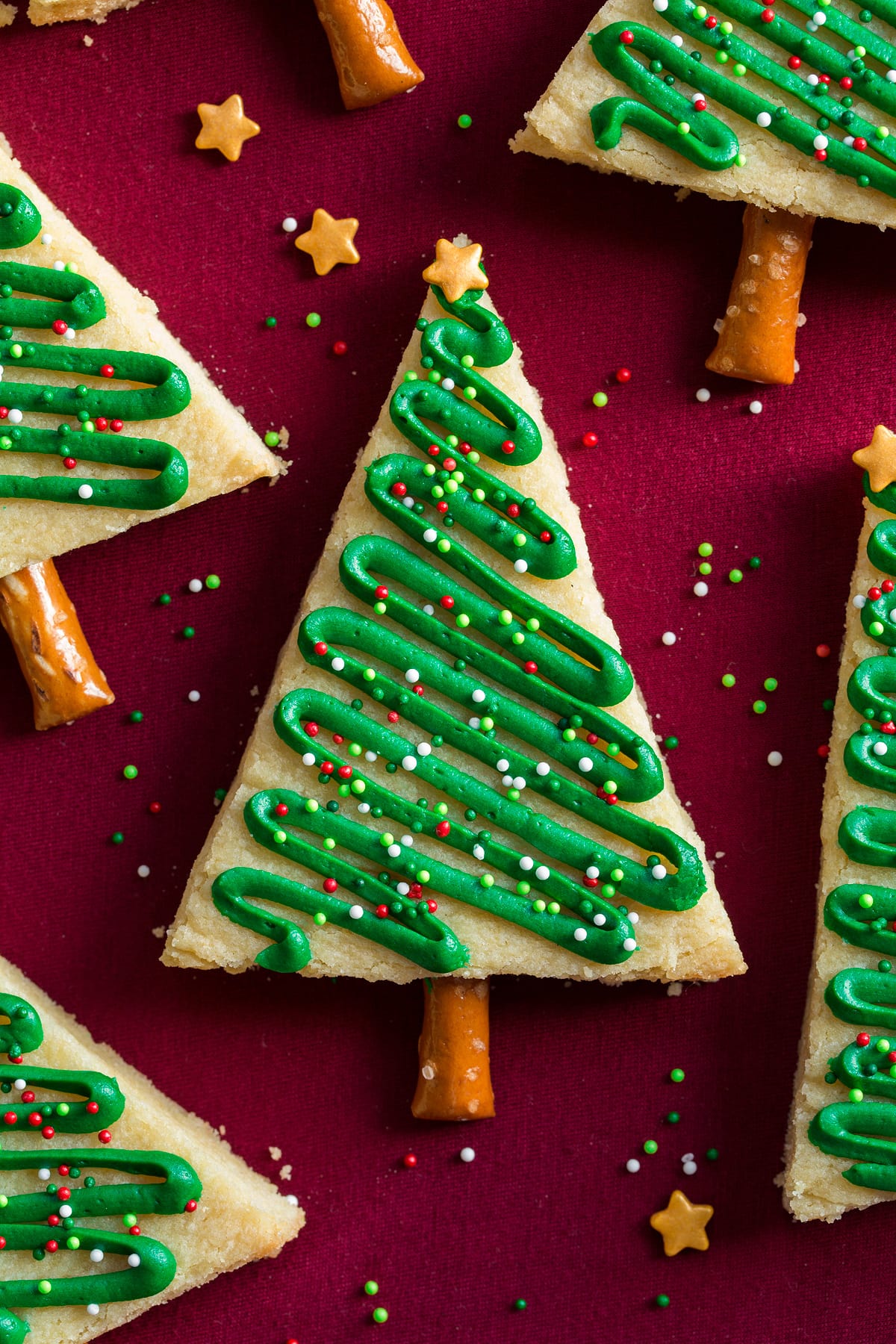 Christmas Tree Cookie Close up overhead image of a frosted Christmas tree sugar cookie.