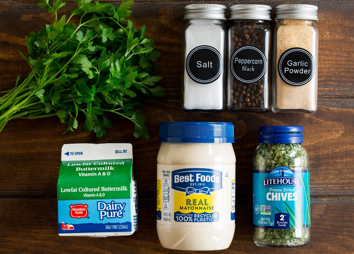 Ranch Dressing Photo of ingredients used to make ranch dressing. Includes fresh parsley, mayonnaise, buttermilk, dried chives, salt, pepper, and garlic powder.