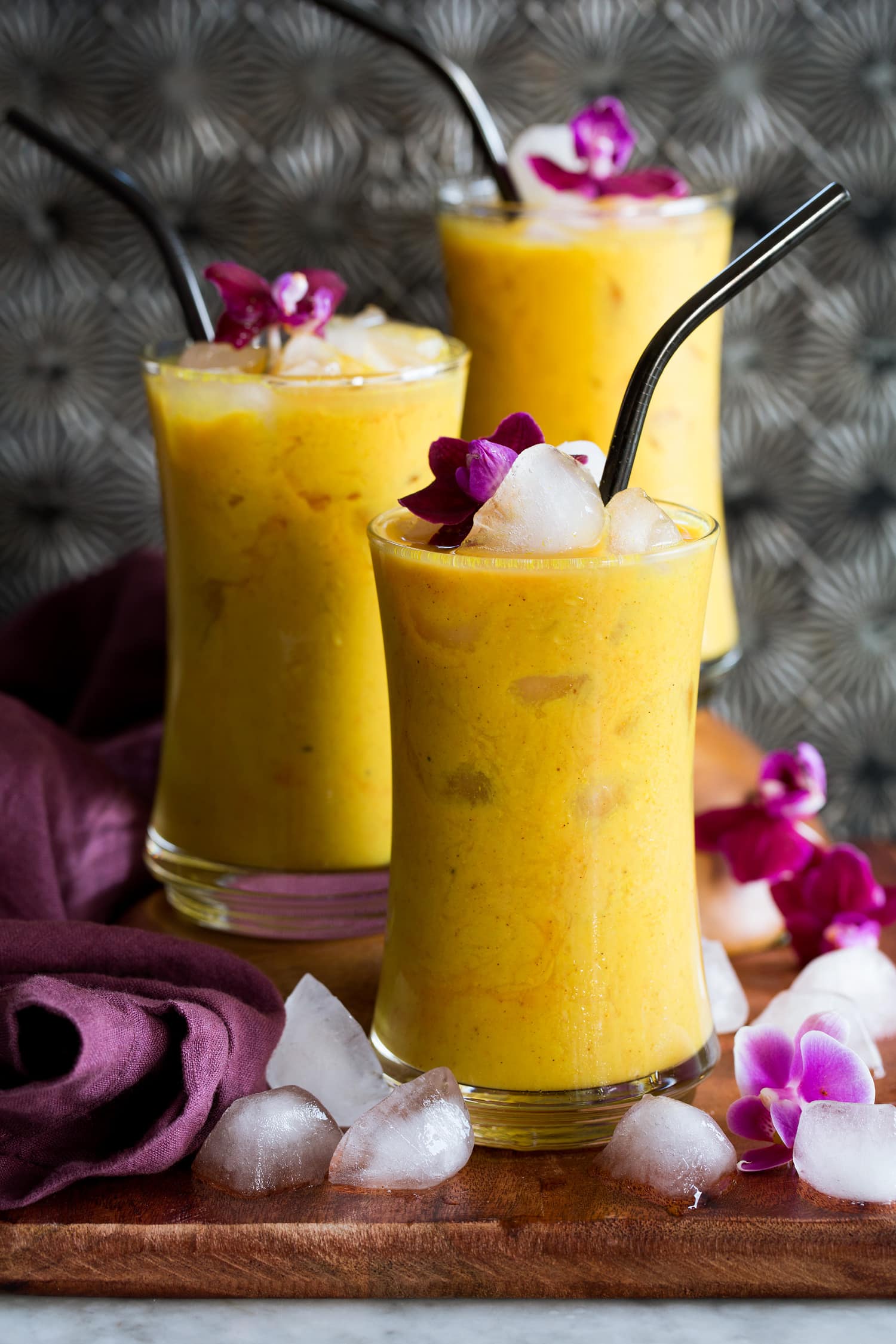 Golden Milk Iced golden milk in tall glasses.