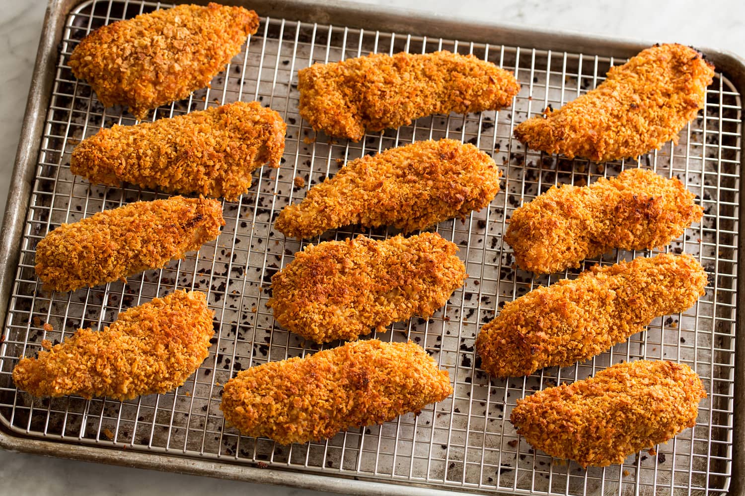 Hot Honey Chicken Chicken strips shown after baking.