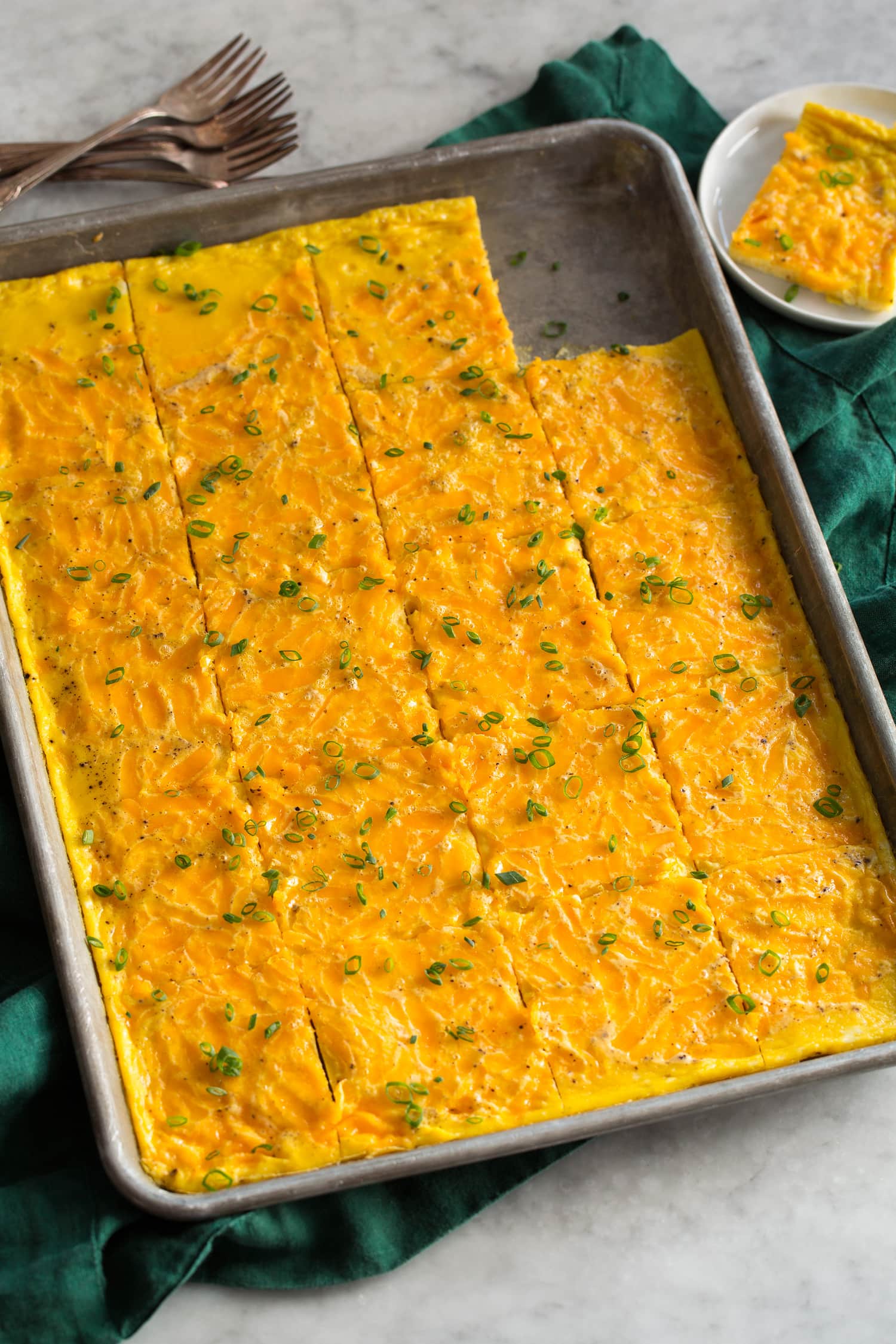 Sheet Pan Eggs Sheet Pan Eggs on a baking sheet cut into slices.
