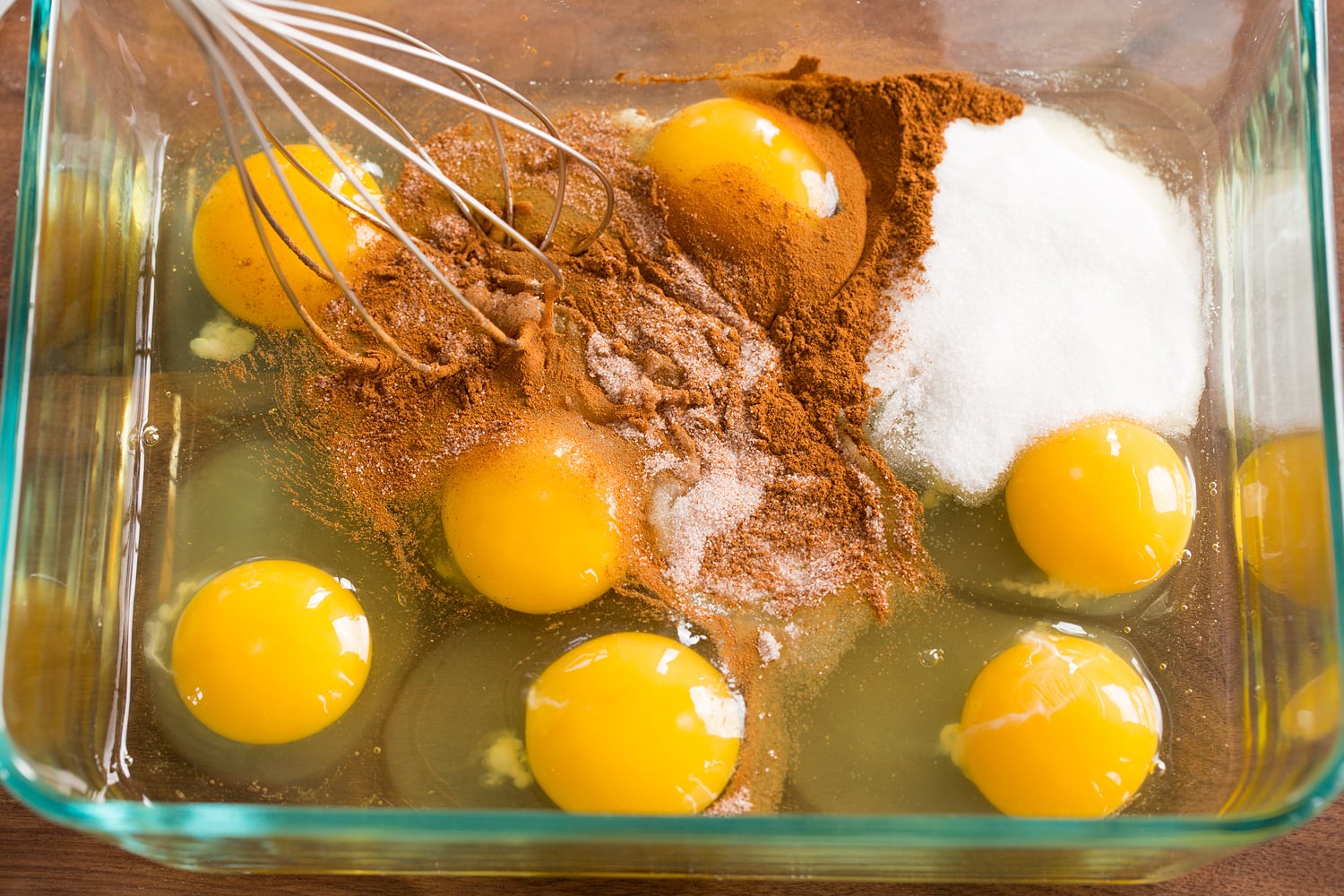 Baked French Toast Eggs, sugar and cinnamon in shallow mixing dish.