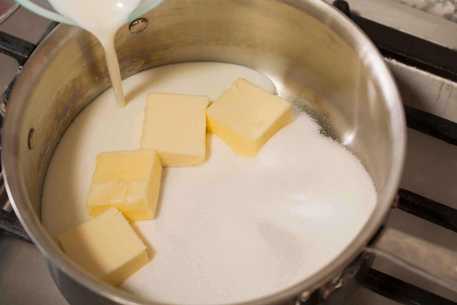 Buttermilk syrup Sugar, butter, and buttermilk in a saucepan.