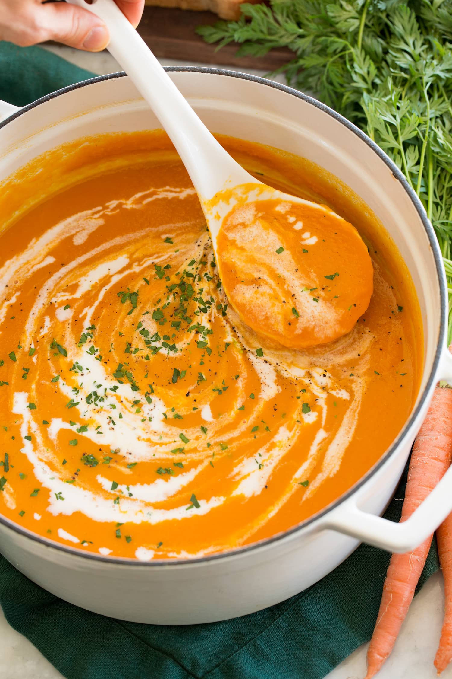 Carrot Soup Close up photo of carrot soup swirled with coconut milk.