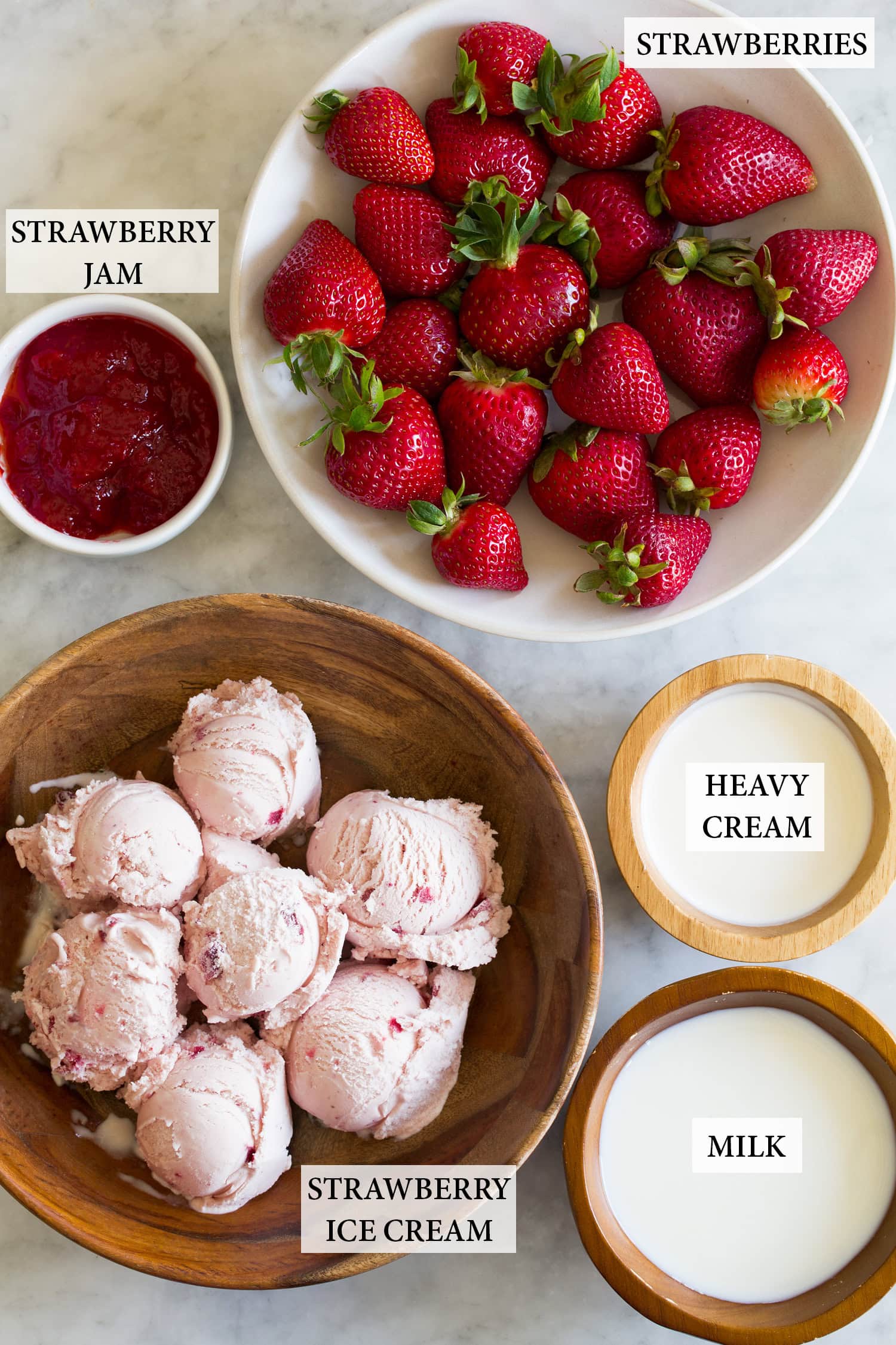 Strawberry Milkshakes Ingredients used to make fresh strawberry milkshakes.