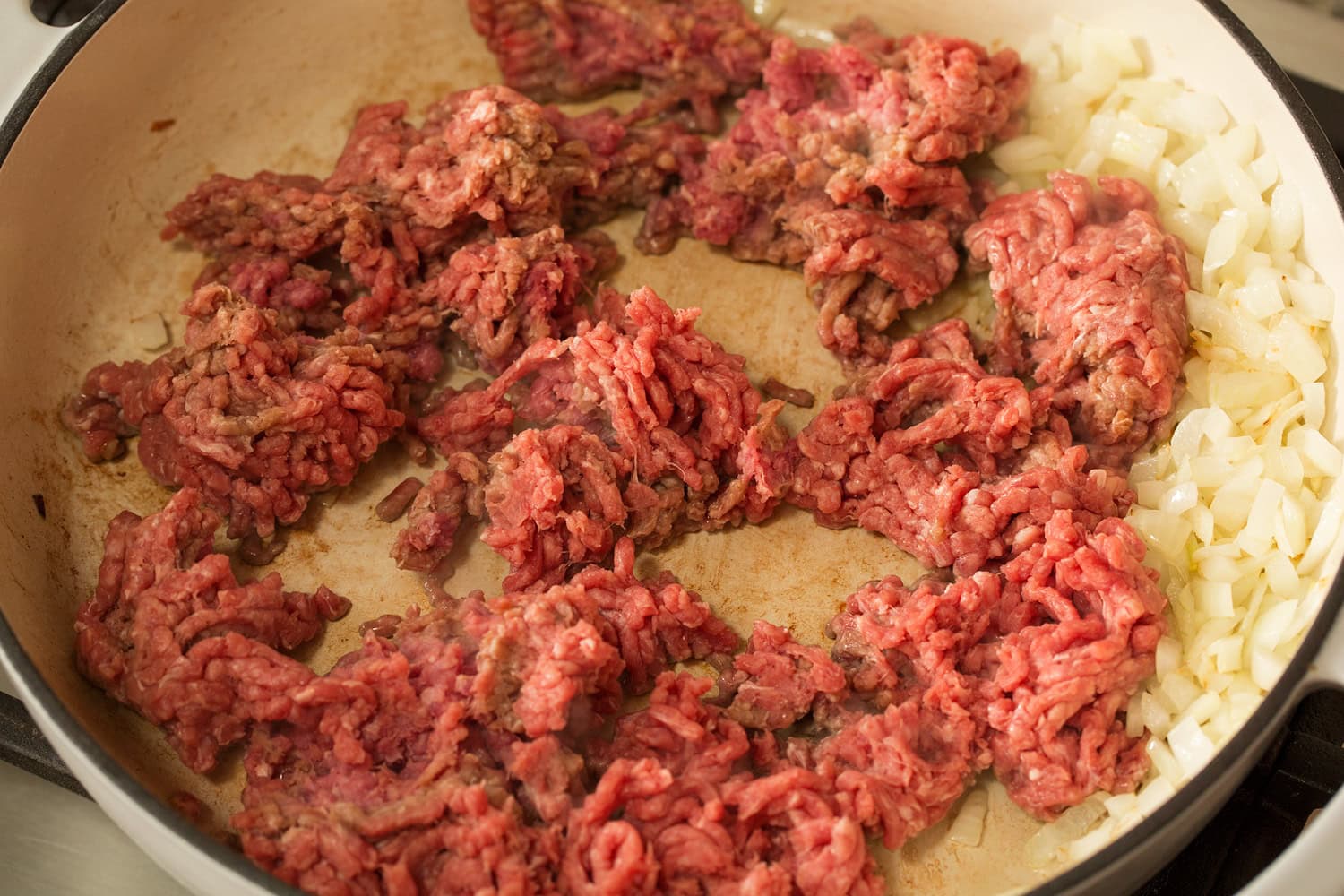 Taco Pasta Browning beef in skillet.