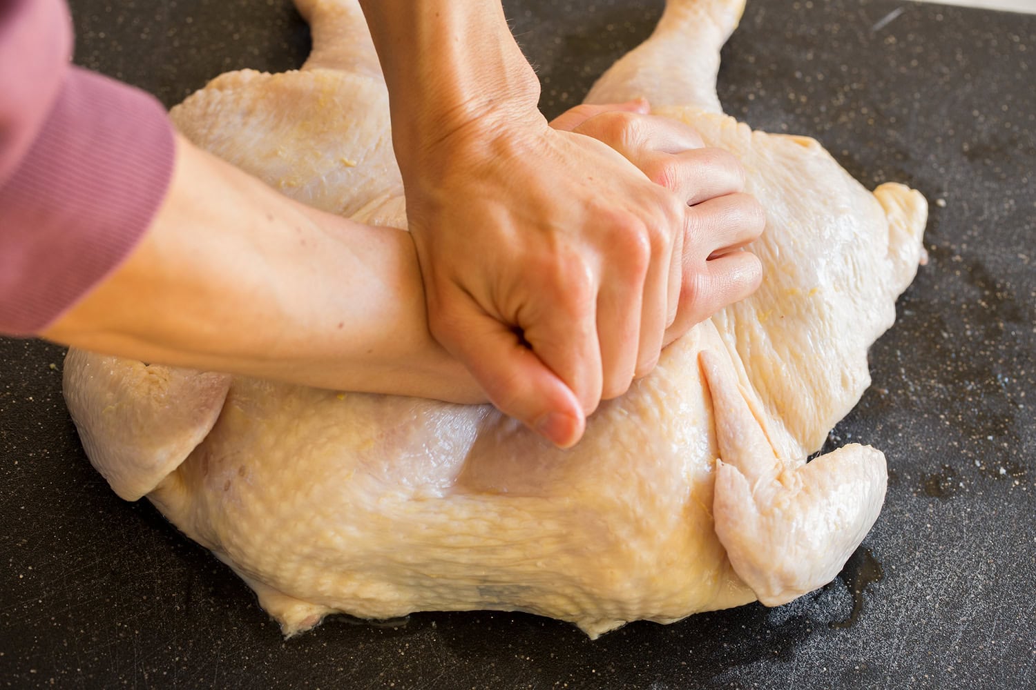 Spatchcock Chicken Breaking bone for spatchcock chicken.