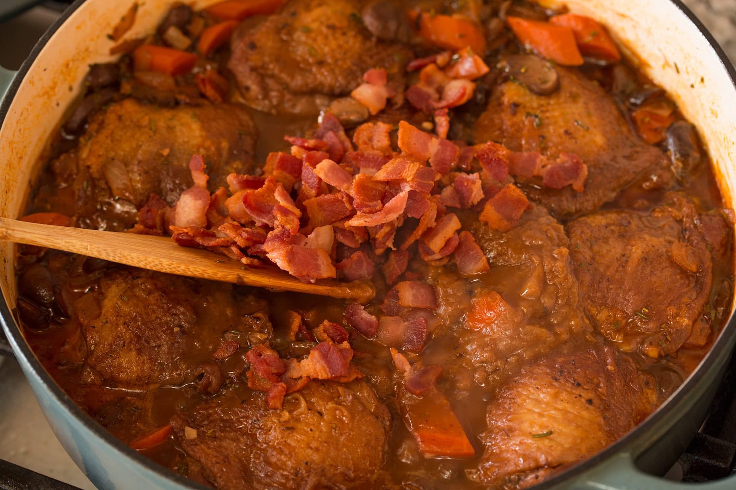 Coq au Vin Bacon and sauce added to coq au vin.