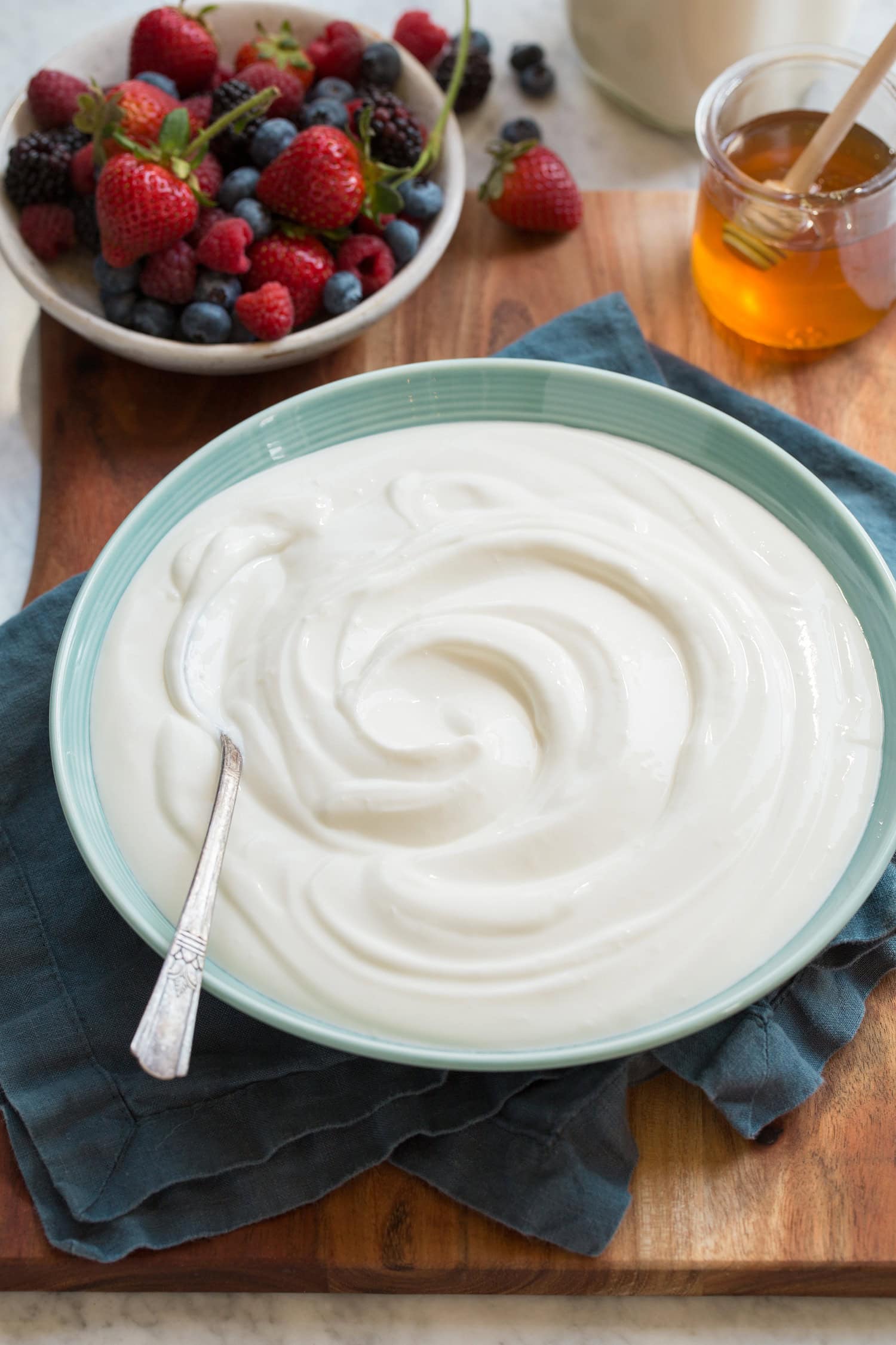 Homemade Yogurt Homemade plain yogurt swirled in a bowl.